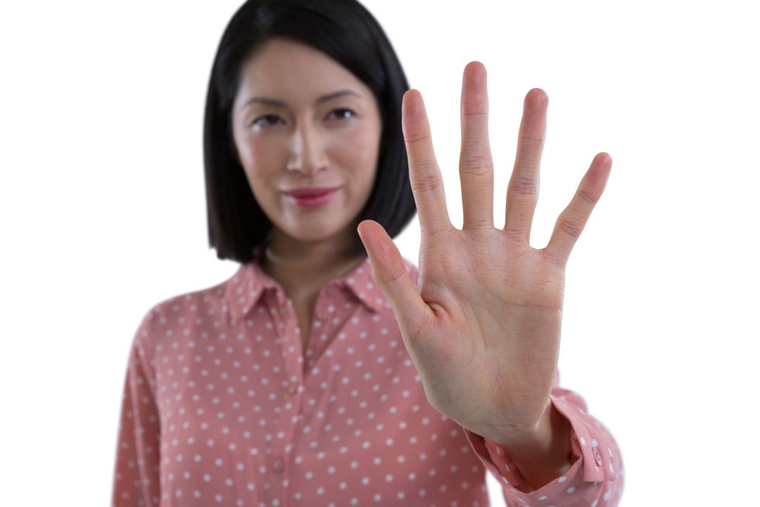 Woman pretending to touch an invisible screen - Free Images, Stock Photos and Pictures on Pikwizard.com