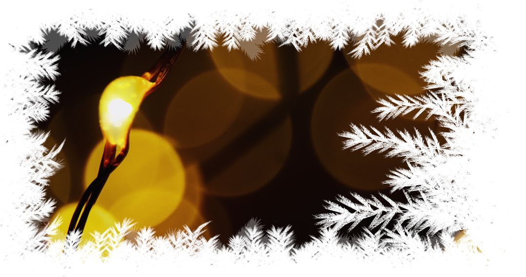 Warm Christmas Bokeh Light Surrounded by Frosty Border