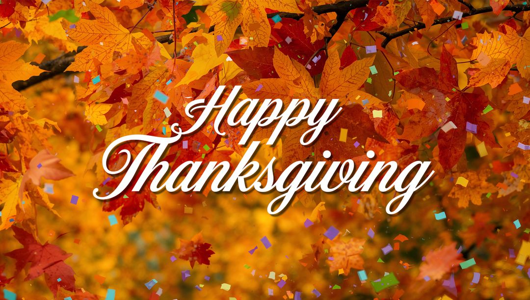 Happy Thanksgiving Script Lettering Over Golden Autumn Leaves with Falling Confetti