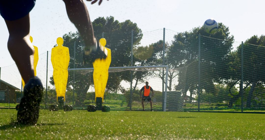 Soccer Player Practicing Free Kicks on Training Field - Free Images, Stock Photos and Pictures on Pikwizard.com