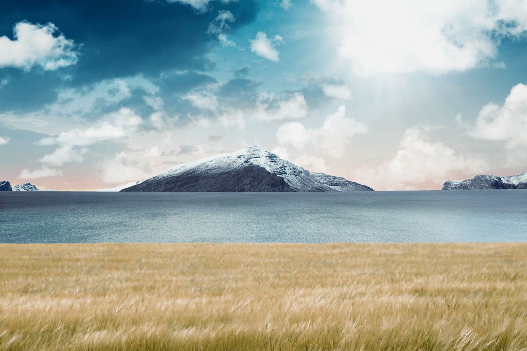 Transparent Island Mountain Under Blue Sky with Meadow