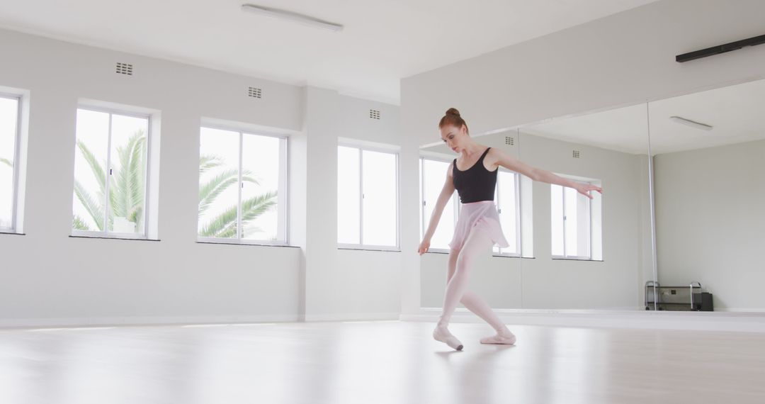 Young Ballet Dancer Practicing in Bright Dance Studio - Free Images, Stock Photos and Pictures on Pikwizard.com