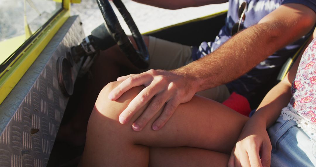 Caucasian Couple Enjoying Road Trip in Beach Buggy by Sea
