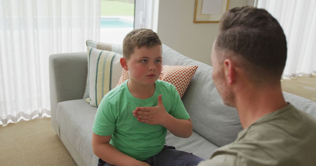 Father Teaching Son to Communicate Using Sign Language at Home - Free Images, Stock Photos and Pictures on Pikwizard.com