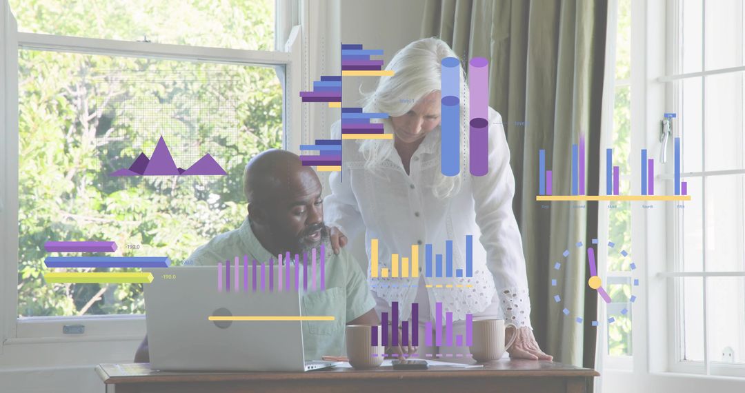 Senior couple collaborating on home data analysis with laptop and infographic visualization