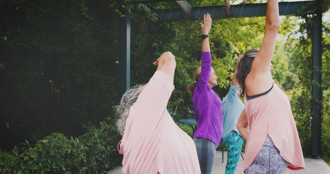 Senior Women Engaging in Outdoor Yoga Practice