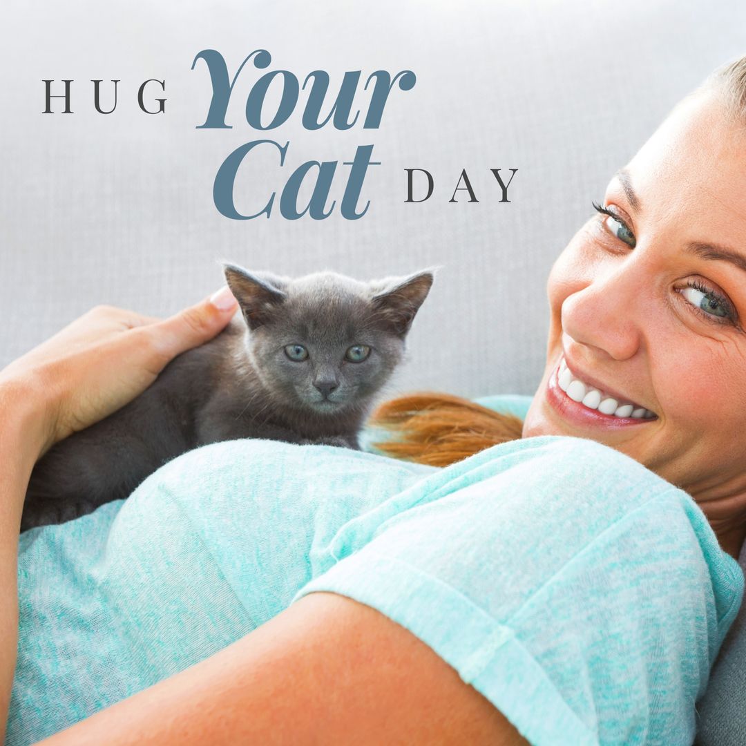 Smiling Woman Embraces Kitten for Hug Your Cat Day