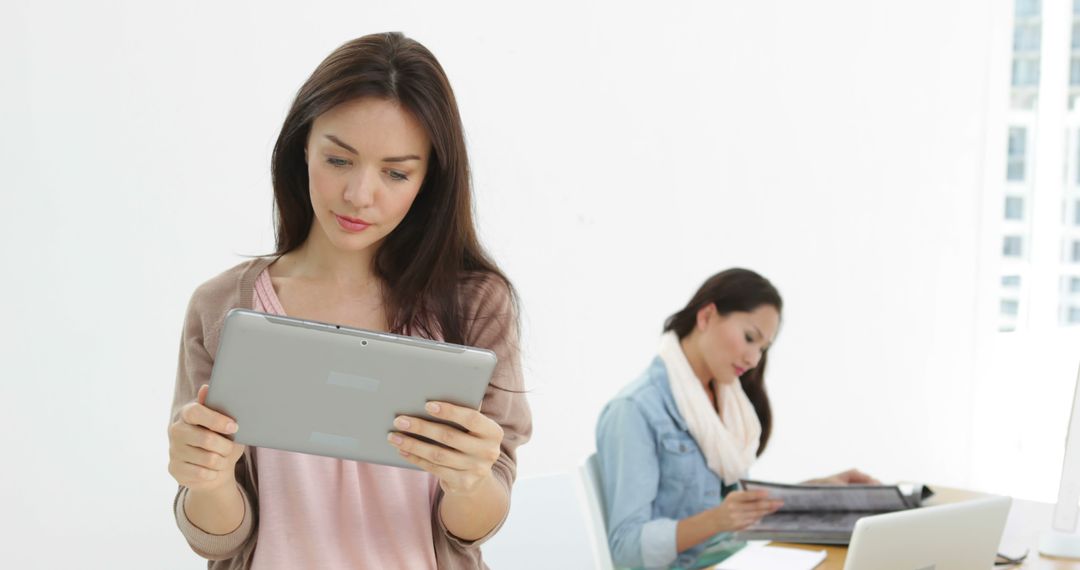 Creative Businesswoman Using Tablet in Design Studio