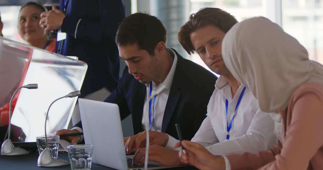 Diverse Business Team Collaborates During Conference Discussion