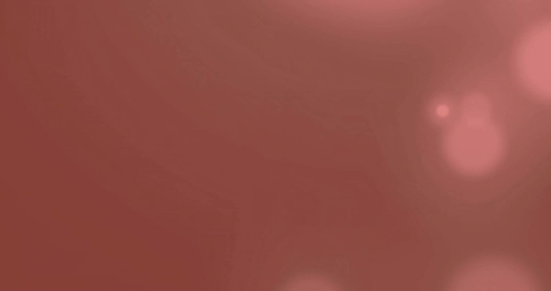 Abstract Light Spots on Warm Red Background