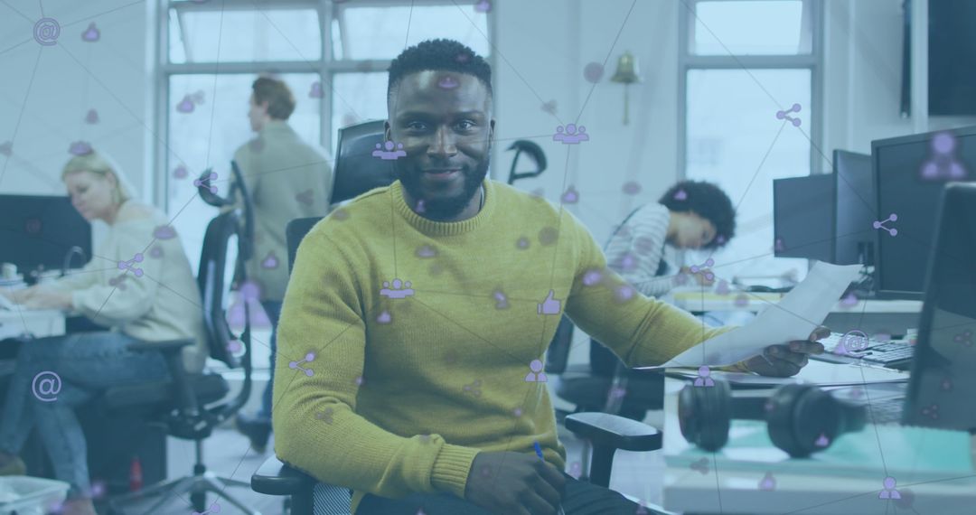 Happy Man in Modern Office Surrounded by Digital Technology