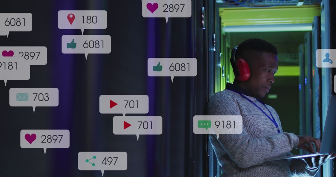 IT Technician Analyzing Data Amid Digital Messaging Icons