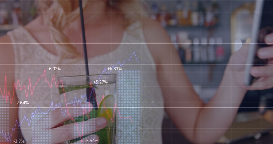 Caucasian Woman Analyzing Data While Enjoying Refreshing Beverage