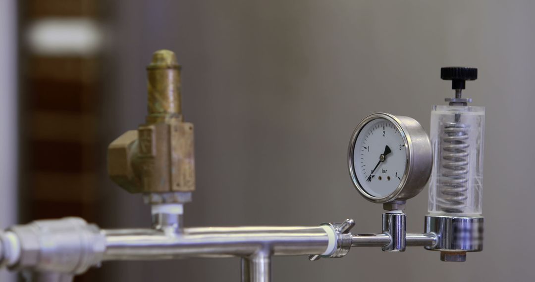 Close-up Industrial Pressure Gauge and Valve on Metallic Pipe - Free Images, Stock Photos and Pictures on Pikwizard.com