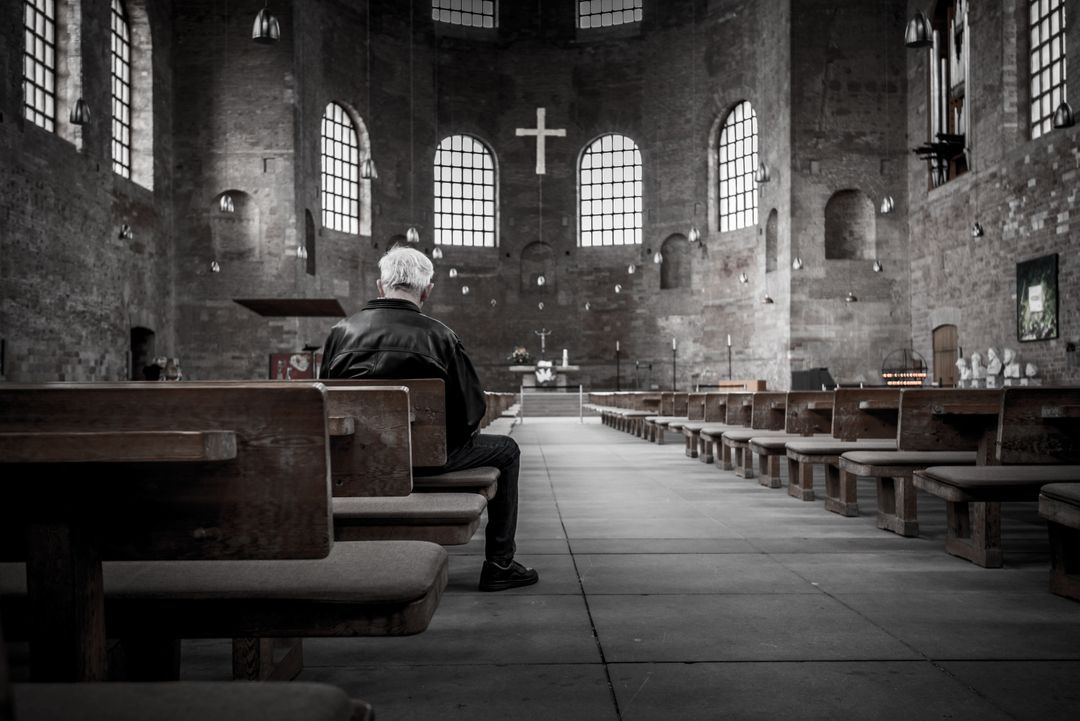 Man Sitting Alone in Traditional Church Interior - Free Images, Stock Photos and Pictures on Pikwizard.com
