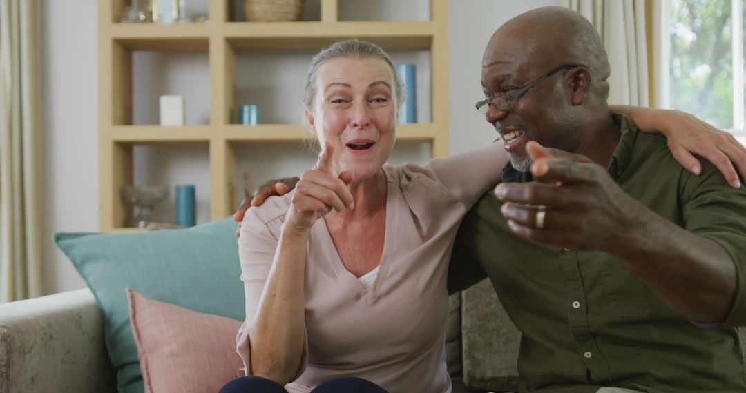 Happy Senior Couple Enjoying Video Call at Home