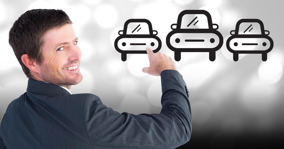 Smiling Businessman Pointing at Car Icons Concept with Bokeh Background - Free Images, Stock Photos and Pictures on Pikwizard.com