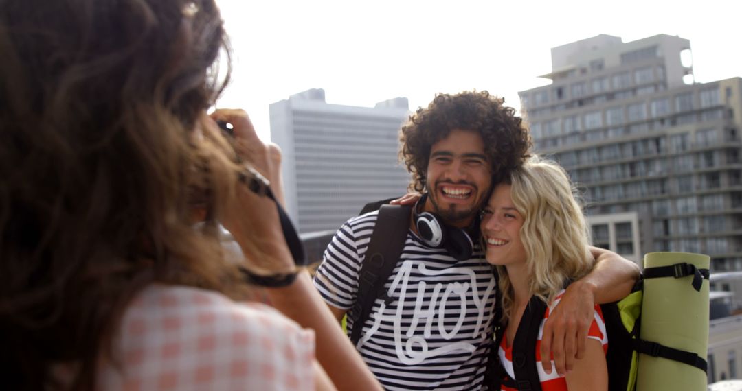 Couple Smiling in Urban City Enjoying Adventures and Capturing Memories