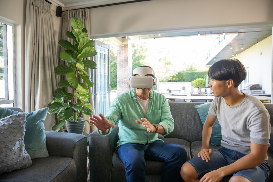 Father and Son Enjoy Virtual Reality Experience Together