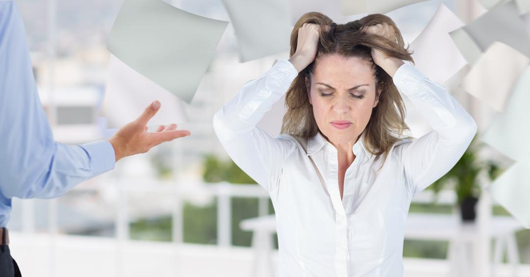 Conceptual image of a businesswoman pulling her hairs in office out of stress - Free Images, Stock Photos and Pictures on Pikwizard.com