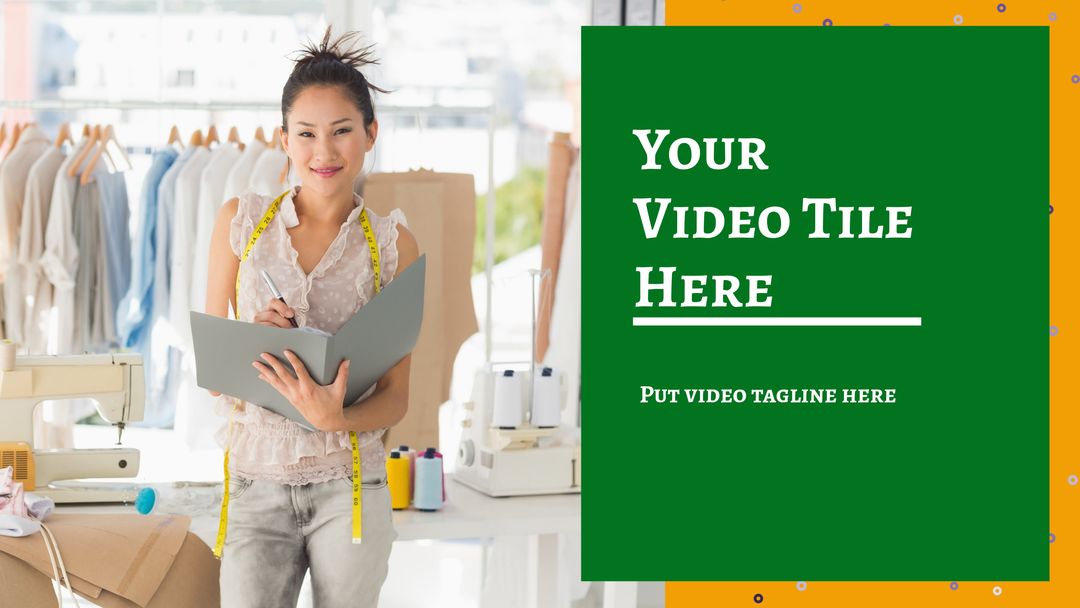 Fashion Designer in Creative Studio Holding Notebook