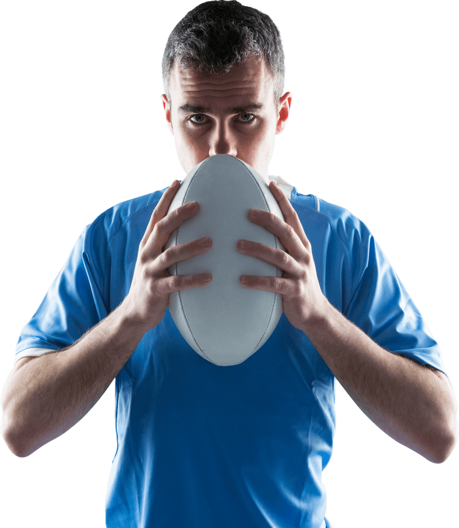 Rugby Player Holding Ball Against Clear Background