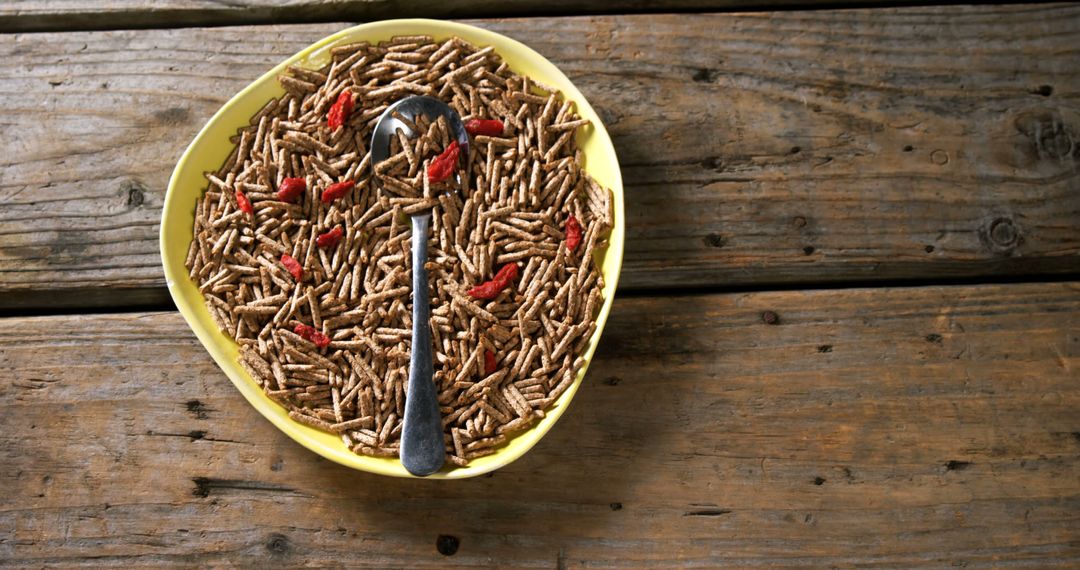 Healthy Fiber Cereal with Goji Berries on Rustic Wooden Table - Free Images, Stock Photos and Pictures on Pikwizard.com