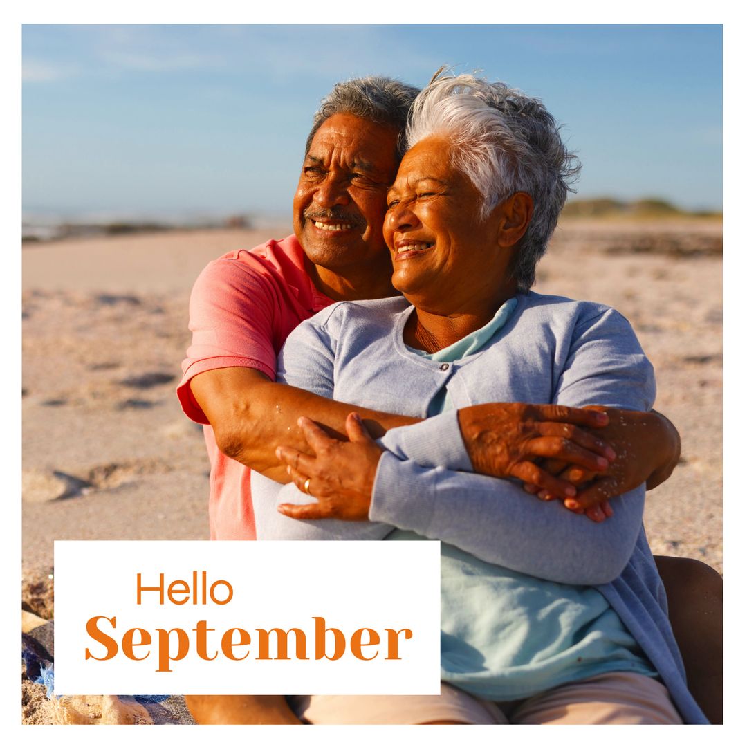 Joyful Senior Couple Embracing on Beach Welcomes September