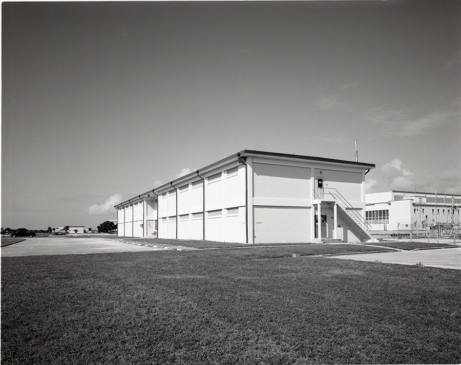 Exterior View of Hangar M Annex Against Clear Sky - Free Images, Stock Photos and Pictures on Pikwizard.com