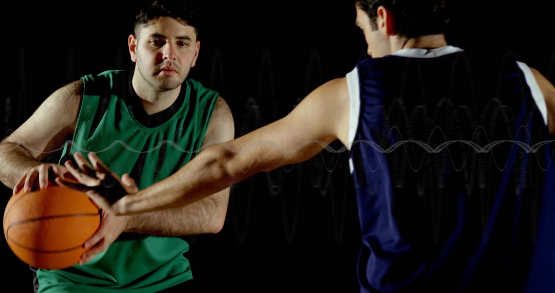 Intense Basketball Duel: Offense Against Defense in Motion