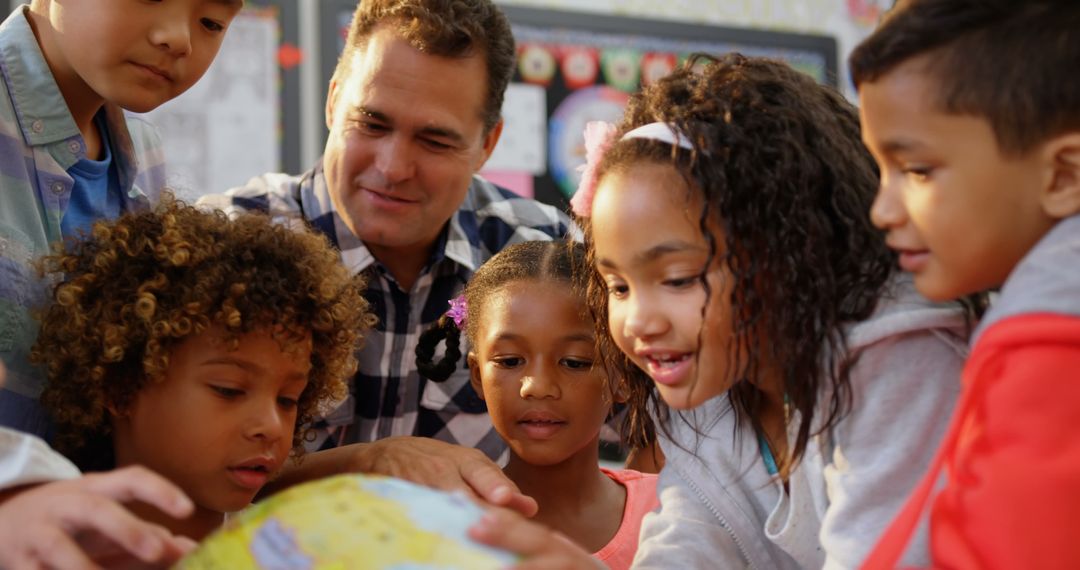 Diverse Classroom Children Learning About Globe with Teacher