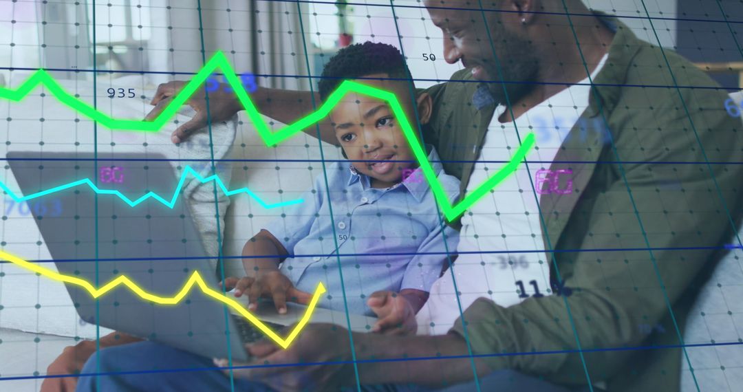 Father Son Duo Learning Financial Data on Laptop at Home