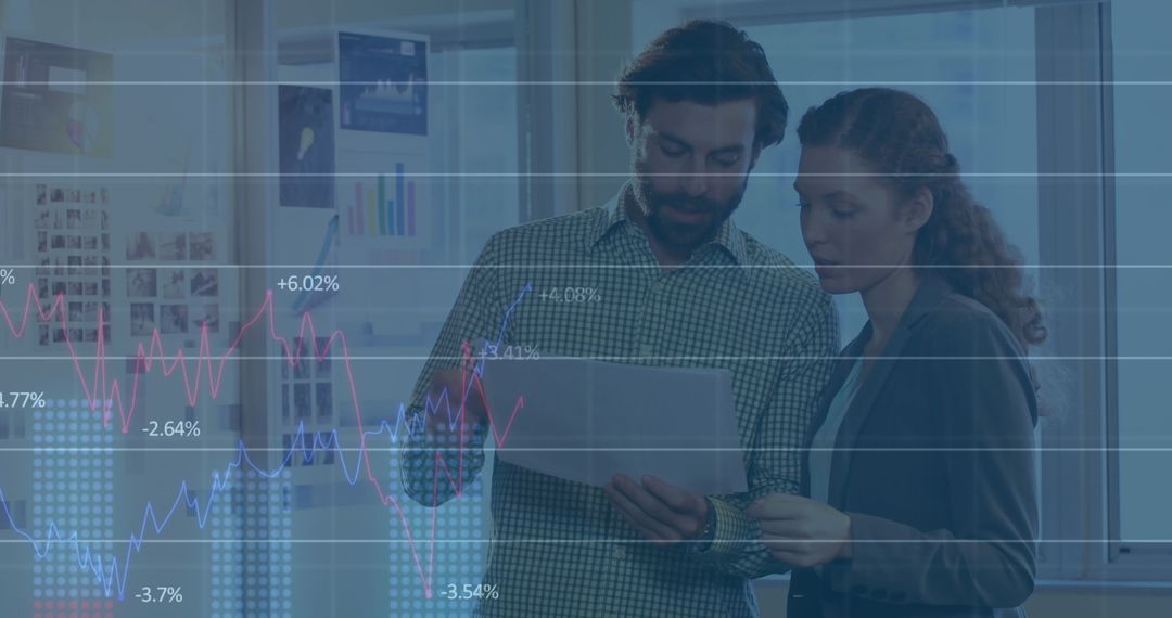 Business Professionals Analyzing Data with Statistical Graphs Overlay
