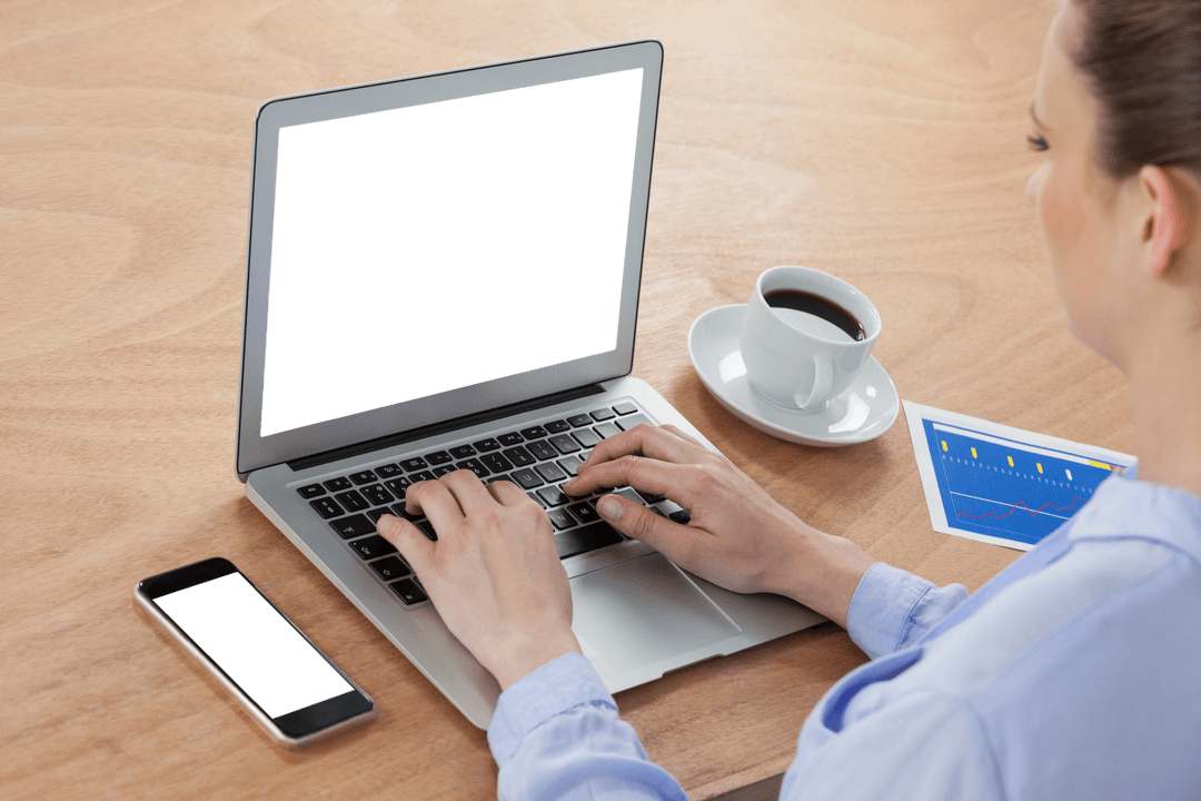 Businesswoman Typing on Transparent Laptop While Having Coffee
