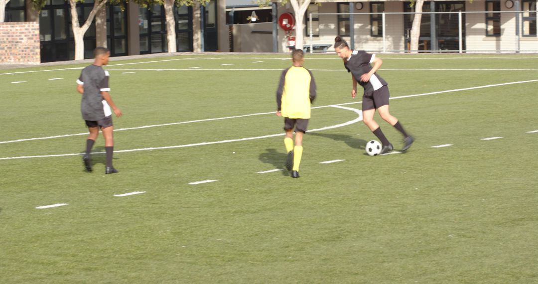 Competitive Youth Soccer Players in Action on Field