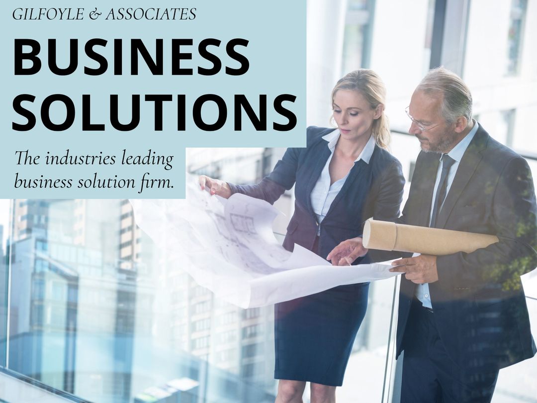 Professionals Analyzing Blueprints in Modern Office