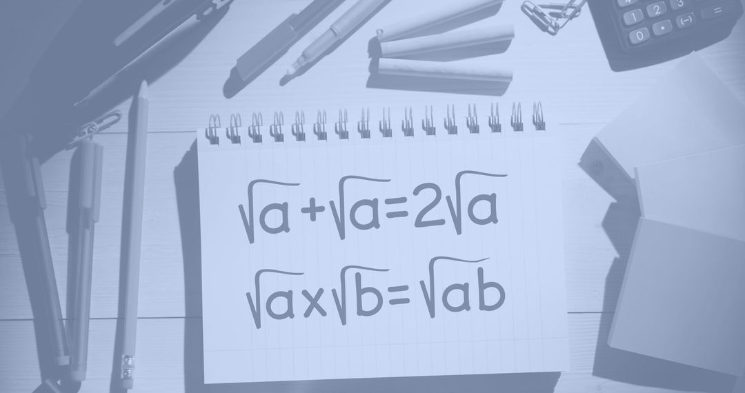 Notebook with Math Equations Surrounded by School Supplies