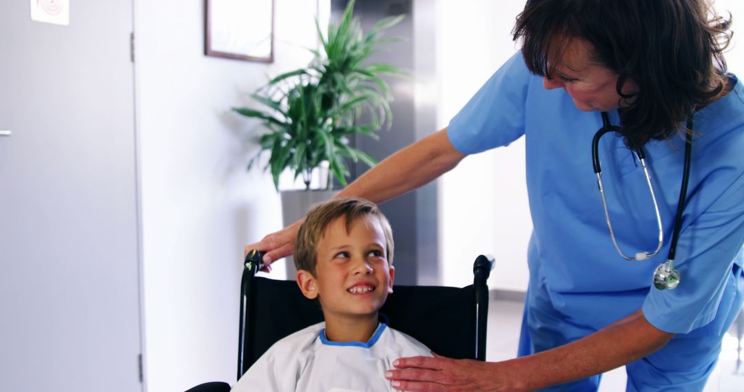 Smiling Nurse Assisting Young Patient in Wheelchair - Free Images, Stock Photos and Pictures on Pikwizard.com