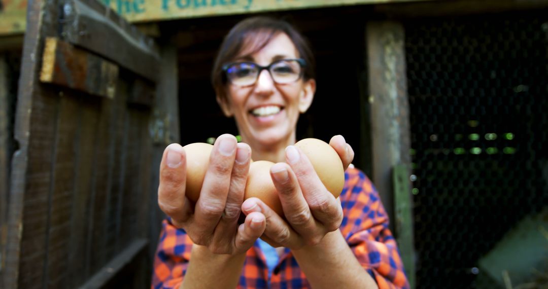 Organic Farmer Holding Freshly Gathered Eggs - Free Images, Stock Photos and Pictures on Pikwizard.com