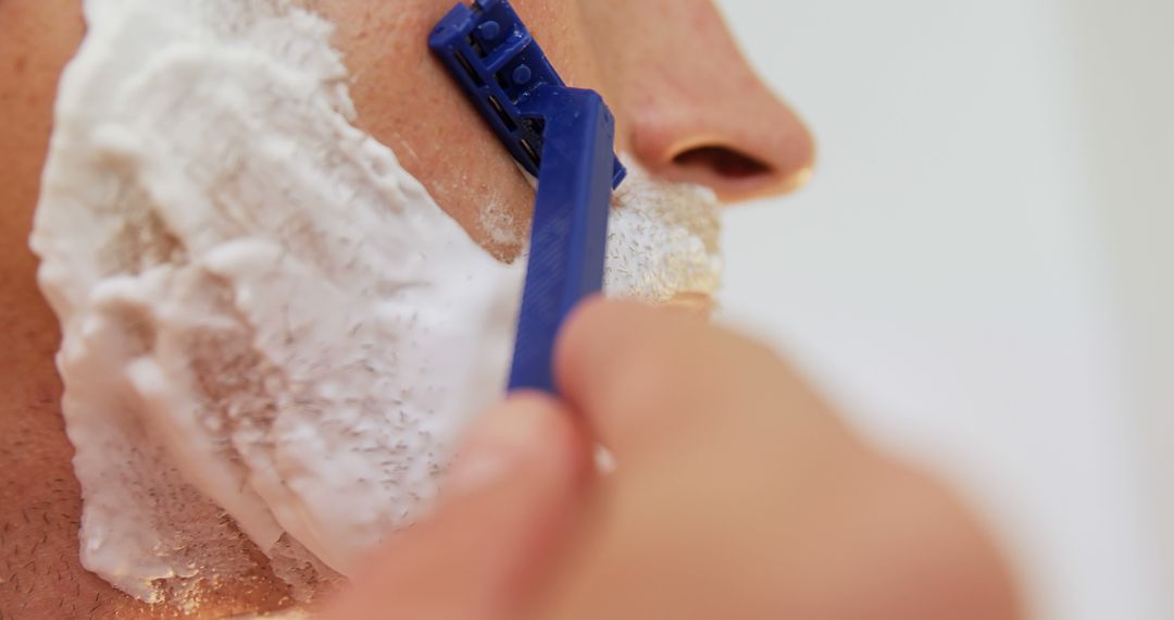 Close-up of Man Shaving with Razor and Foam - Free Images, Stock Photos and Pictures on Pikwizard.com