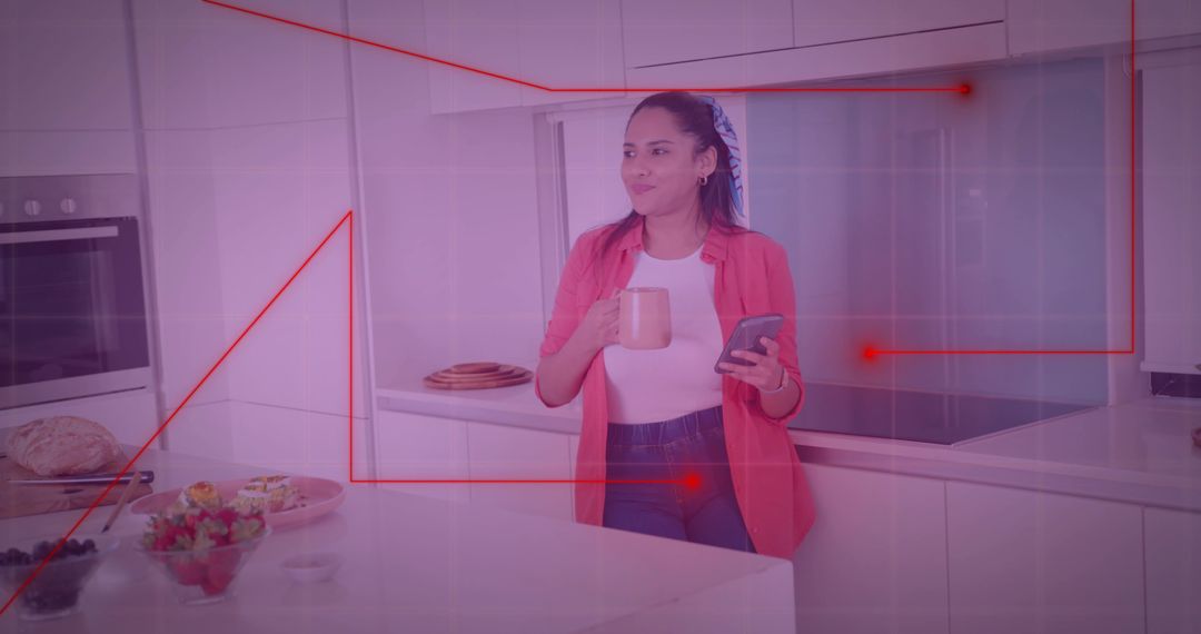 Woman Drinking Coffee and Using Smartphone in Modern Kitchen
