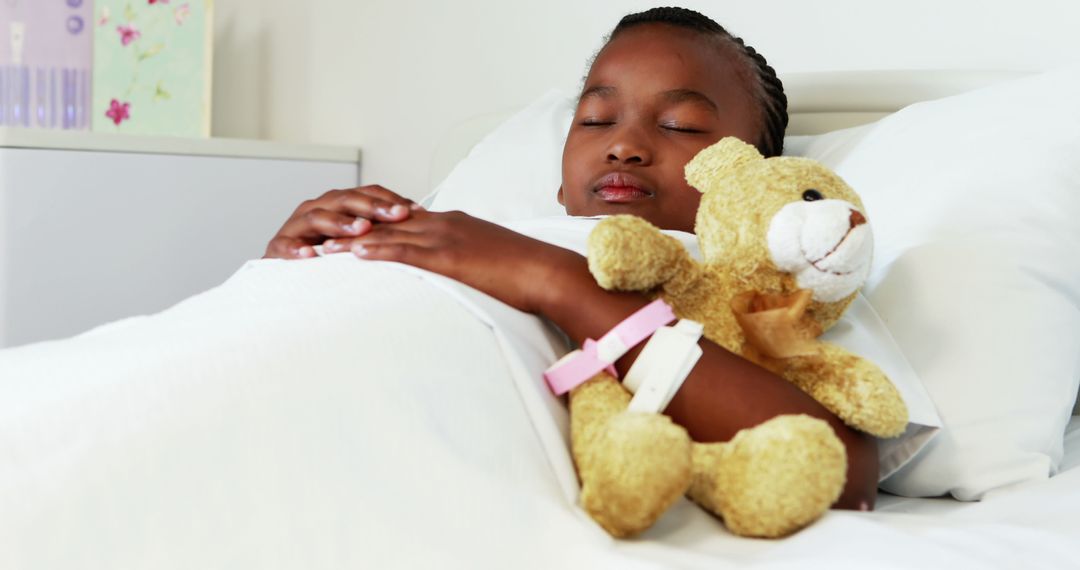 Child Resting Peacefully in Hospital Bed with Teddy Bear - Free Images, Stock Photos and Pictures on Pikwizard.com