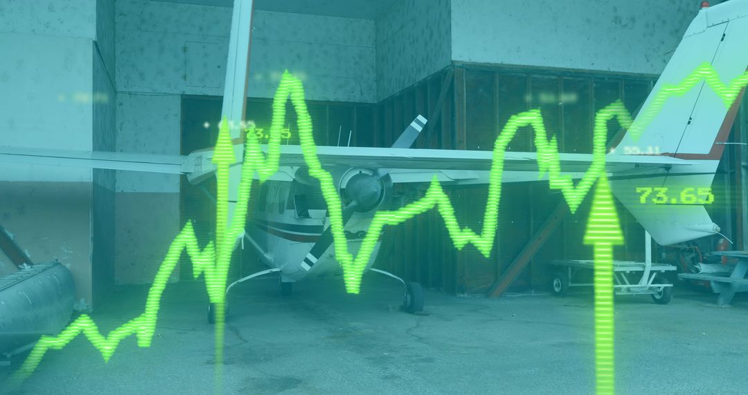 Aircraft in Hangar With Overlay of Dynamic Trading Graph