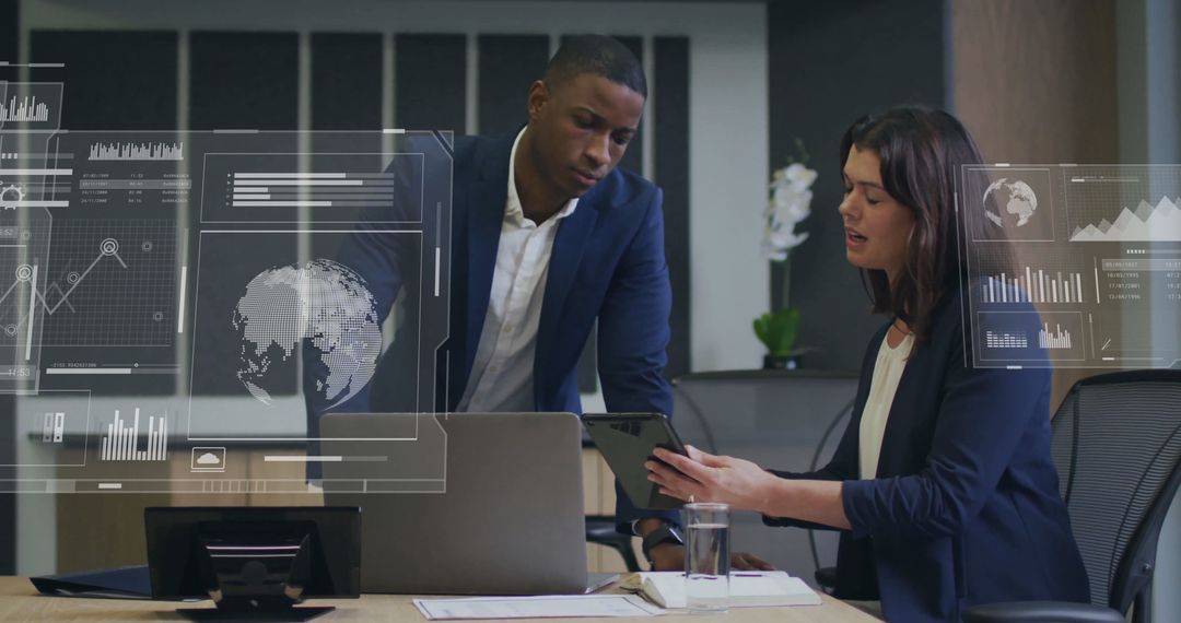 Business Professionals Analyzing Data With Digital Wall Screens