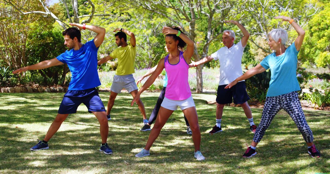 Diverse Group Exercising Outdoors in Park Setting - Free Images, Stock Photos and Pictures on Pikwizard.com