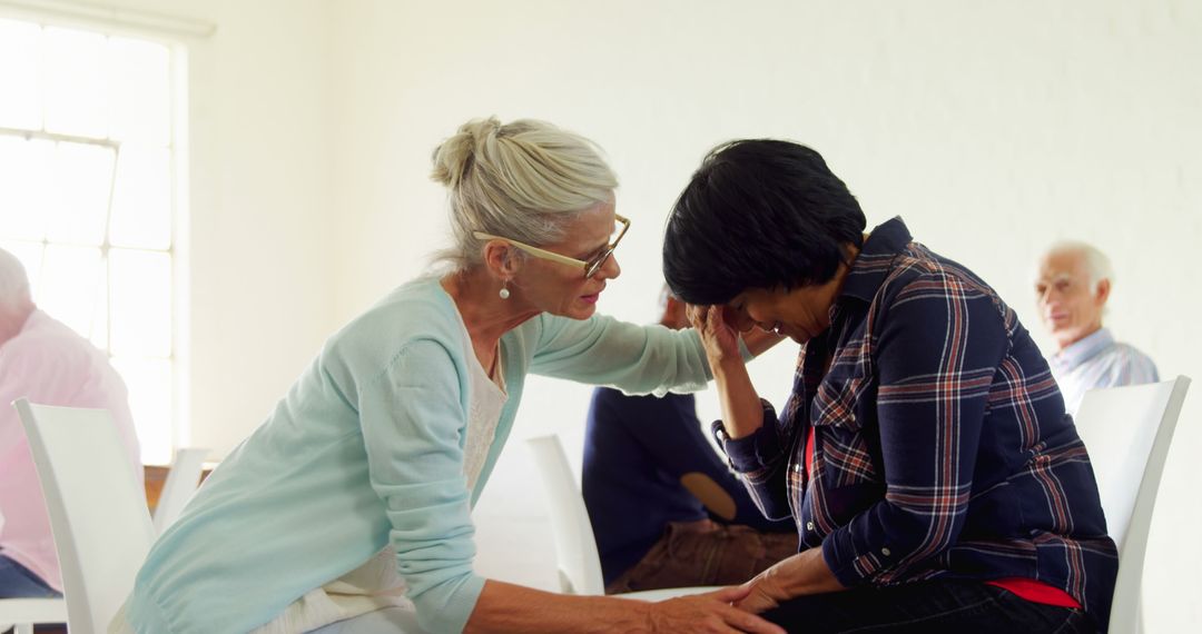 Senior Woman Comforting During Support Group Meeting - Free Images, Stock Photos and Pictures on Pikwizard.com