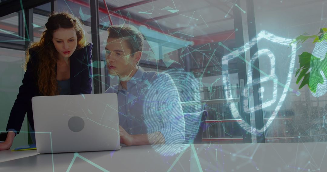 Team Analyzing Cyber Security Data on Laptop with Digital Overlay