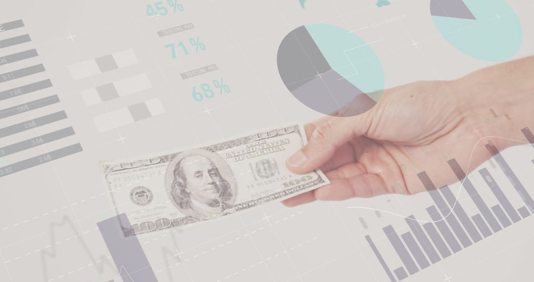 Hand Holding US Dollar Bill with Financial Graph Overlays