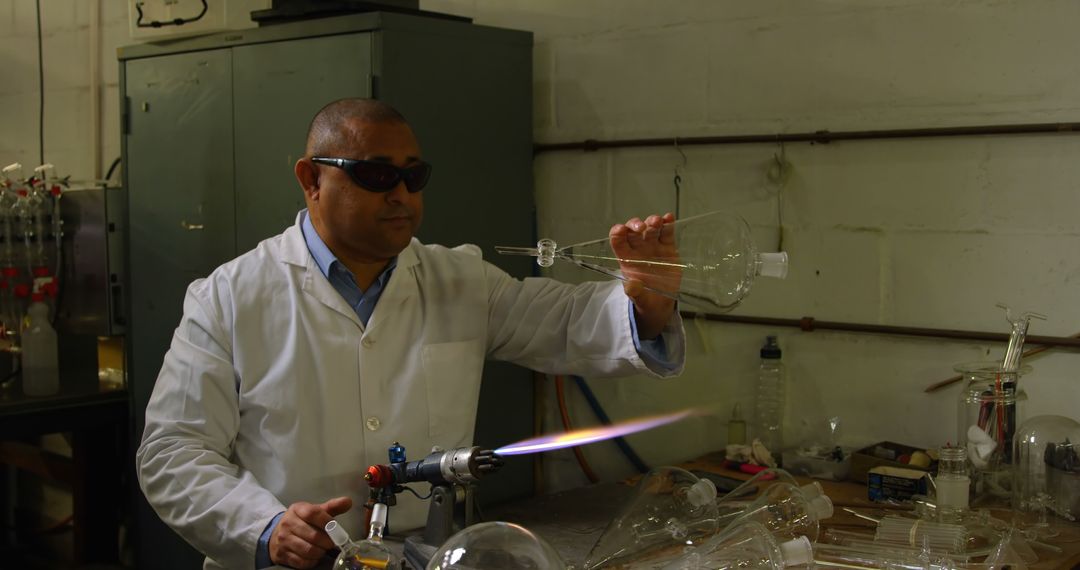 Scientist Preparing Laboratory Glassware Using a Blowtorch - Free Images, Stock Photos and Pictures on Pikwizard.com