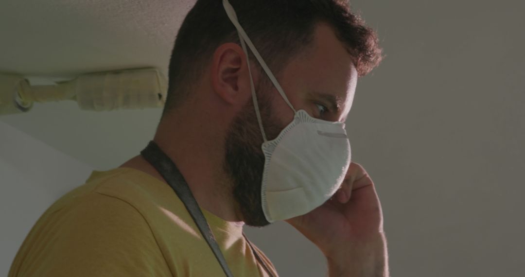 Thoughtful Man Wearing Mask Indoors Choosing Healthy Option - Free Images, Stock Photos and Pictures on Pikwizard.com